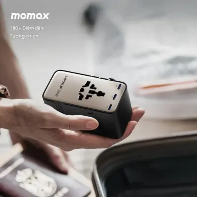 Bộ chuyển đổi du lịch MOMAX UA28L AC kép 7 cổng 205W 1-World² - Mang cả thế giới điện vào hành lý của bạn với <strong>Bộ chuyển đổi du lịch MOMAX UA28L AC kép 7 cổng 205W 1-World²</strong>. Tương thích với hơn 200 quốc gia nhờ các chân cắm tích hợp thông minh, bộ chuyển đổi <strong>MOMAX UA28L</strong> là trạm cấp nguồn vạn năng. Với tổng công suất 205W (bao gồm khả năng cấp nguồn AC và sạc USB) và đặc biệt là khả năng cấp nguồn AC kép độc đáo cùng 7 cổng USB (USB-C & USB-A), bạn có thể sạc mọi thiết bị cùng lúc, kể cả những thiết bị sử dụng phích cắm truyền thống. Nhỏ gọn, an toàn và cực kỳ đa năng. <strong>MOMAX UA28L</strong> - Giải pháp năng lượng "tất cả trong một", đáng tin cậy cho mọi chuyến đi.