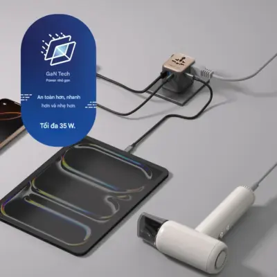 Bộ sạc du lịch MOMAX UA27 mini GaN 5 cổng 1-World² 35W với AC kép - Giải phóng bạn khỏi mọi lo lắng về sạc khi du lịch quốc tế với <strong>Bộ sạc du lịch đa năng MOMAX UA27 mini GaN 5 cổng 1-World² 35W với AC kép</strong>. Tương thích hơn 200 quốc gia với các chân cắm tích hợp thông minh, bộ sạc <strong>MOMAX UA27</strong> mang đến tổng công suất sạc lên tới 35W đáng tin cậy nhờ công nghệ GaN. Với 5 cổng sạc USB (3 USB-C PD & 2 USB-A QC) và đặc biệt là khả năng cấp nguồn AC kép độc đáo, bạn có thể nạp năng lượng cho mọi thiết bị cùng lúc, kể cả những thiết bị sử dụng phích cắm truyền thống. Nhỏ gọn, an toàn và cực kỳ đa năng. <strong>MOMAX UA27</strong> là giải pháp năng lượng "tất cả trong một", đáng tin cậy cho mọi chuyến đi.