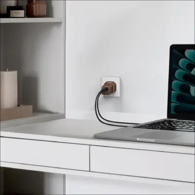 Bộ sạc MOMAX UM71UKL2 GaN 2 cổng 1-Charge 30W - Trải nghiệm tốc độ sạc nhanh trong một thiết kế siêu nhỏ gọn với <strong>Bộ sạc MOMAX UM71UKL2 GaN 2 cổng 1-Charge 30W</strong>. Công suất sạc nhanh 30W Power Delivery mạnh mẽ nhờ công nghệ GaN tiên tiến, đủ sức nạp năng lượng cho smartphone, máy tính bảng và cả laptop mỏng nhẹ một cách hiệu quả. Với 2 cổng sạc (thường 1 USB-C PD & 1 USB-A QC), bạn có thể sạc đồng thời hai thiết bị. Chân cắm UK (3 chấu) tích hợp, an toàn và đáng tin cậy. <strong>MOMAX UM71UKL2</strong> là người bạn đồng hành lý tưởng cho mọi nhu cầu sạc nhanh, đơn giản và hiệu quả, giúp bạn luôn kết nối mọi lúc mọi nơi.