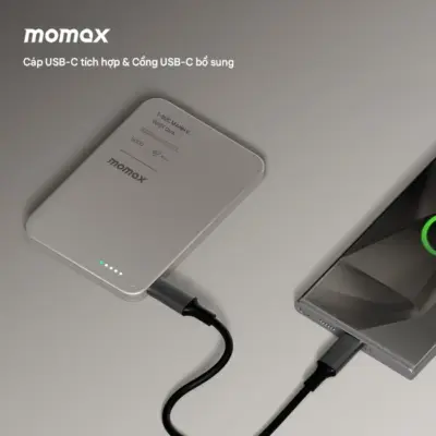 Pin dự phòng MOMAX IP157 1-Power F.Pass⁺ Bộ pin từ tính 5000mAh có cáp tích hợp - Mang theo nguồn năng lượng tiện lợi tối đa với <strong>Pin dự phòng không dây từ tính MOMAX IP157 1-Power F.Pass⁺ Bộ pin từ tính 5000mAh có cáp tích hợp</strong>. Thiết kế siêu nhỏ gọn với dung lượng 5000mAh, hoàn hảo cho nhu cầu bổ sung pin nhanh chóng. Công nghệ từ tính "hít" chặt vào iPhone (hỗ trợ MagSafe) mang lại trải nghiệm sạc không dây mượt mà. Điểm nhấn độc đáo là cáp USB-C tích hợp sẵn, luôn có sẵn để sạc pin hoặc thiết bị khác. Công nghệ F.Pass⁺ đảm bảo sạc hiệu quả. <strong>MOMAX IP157 1-Power F.Pass⁺</strong> là sự kết hợp hoàn hảo giữa tính di động, tiện ích và hiệu năng.