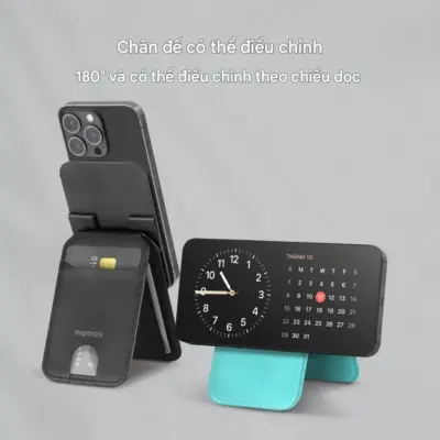 Ví đựng thẻ từ tính MOMAX SR51 có chân đế có thể điều chỉnh - Nâng tầm tiện ích và linh hoạt cho chiếc iPhone (tương thích MagSafe) hoặc điện thoại của bạn với <strong>Ví đựng thẻ từ tính MOMAX SR51</strong> có chân đế có thể điều chỉnh. Sản phẩm 2 trong 1 này không chỉ là ví đựng thẻ mỏng gọn (thường 1-3 thẻ) mà còn tích hợp chân đế đa năng với khả năng điều chỉnh góc độ linh hoạt hơn. Gắn chắc chắn vào mặt lưng điện thoại bằng từ tính mạnh mẽ, <strong>MOMAX SR51</strong> giúp bạn mang theo những thẻ thiết yếu và dựng máy rảnh tay xem phim, gọi video ở mọi góc độ bạn muốn. Thiết kế sang trọng, bền bỉ. Với <strong>MOMAX SR51</strong>, bạn sẽ có được sự tiện lợi, tối giản và khả năng tùy chỉnh góc nhìn vượt trội.