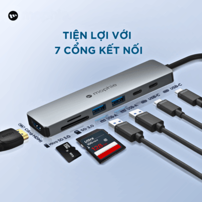 Hub Chuyển Đổi USB-C Mophie 7 IN 1 100W – Đa Năng, Mạnh Mẽ Cho Mọi Kết Nối - Nâng cao hiệu suất làm việc và giải trí với Hub chuyển đổi USB-C Mophie 7 IN 1 100W đa năng. Thiết bị này biến một cổng USB-C duy nhất trên laptop, máy tính bảng thành 7 cổng kết nối thiết yếu: HDMI 4K, 2 cổng USB-A tốc độ cao, 1 cổng USB-C PD 100W, khe cắm thẻ nhớ SD và Micro SD, cùng cổng Ethernet Gigabit. Với khả năng sạc xuyên lên đến 100W, Mophie 7 IN 1 100W không chỉ mở rộng khả năng kết nối mà còn giữ cho thiết bị của bạn luôn đầy pin. Gọn nhẹ, bền bỉ và dễ sử dụng, Hub chuyển đổi USB-C Mophie 7 IN 1 100W là phụ kiện hoàn hảo cho công việc, học tập và giải trí mọi lúc mọi nơi.
